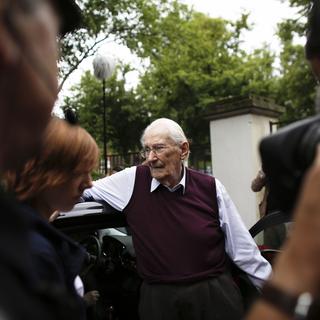 Oskar Groening, l'ancien comptable d'Auschwitz âgé de 94 ans, a été condamné à 4 ans de prison pour "complicité de meurtre". [AP/Keystone - Markus Schreiber]