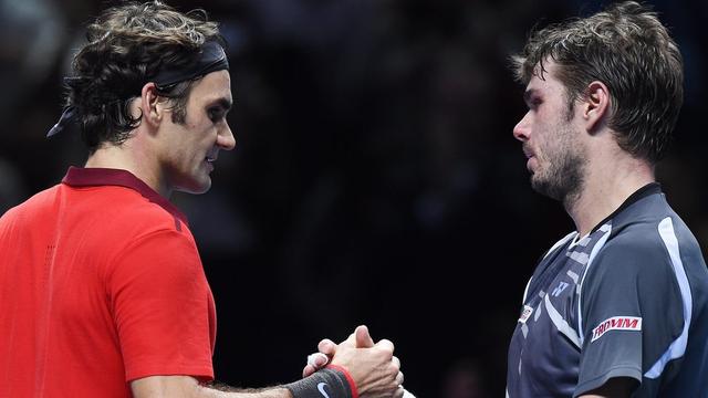 Federer face à Wawrinka aux Masters de Londres en novembre dernier. [EPA/Keystone - Andy Rain]