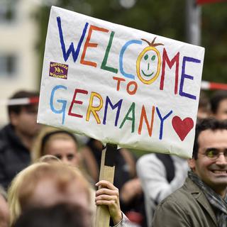 L'accueil réservé aux réfugiés en Allemagne a interpellé toute l'Europe. [AP/Keystone - Martin Meissner]