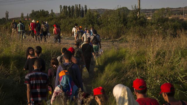 Selon Europol, près de 30'000 passeurs sont actifs autour de la Méditerranée. [AP Photo/Keystone - Santi Palacios]