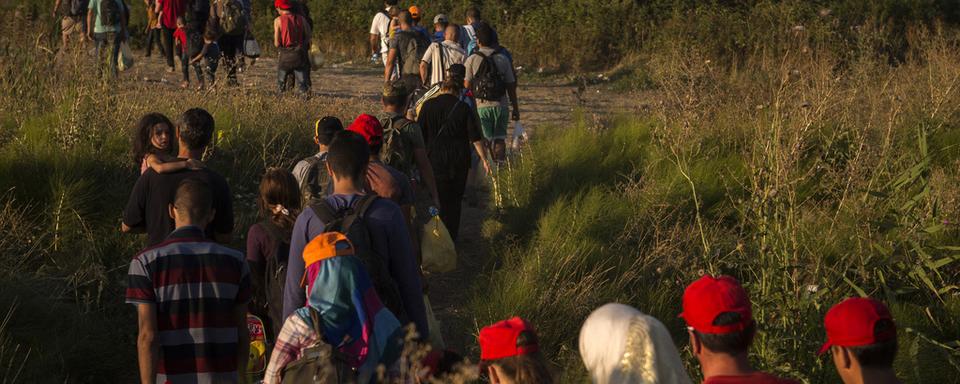 Selon Europol, près de 30'000 passeurs sont actifs autour de la Méditerranée. [AP Photo/Keystone - Santi Palacios]