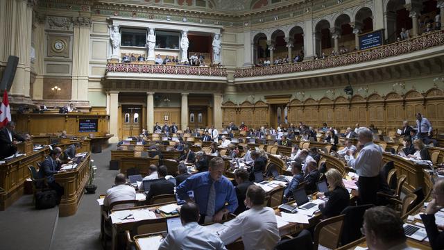 Session spéciale au Parlement. [Keystone - Peter Klaunzer]