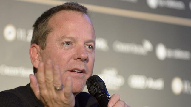 Kiefer Sutherland reçoit le "Golden Eye Award" lors du Festival du film de Zurich 2015. [Keystone - Anthony Anex]