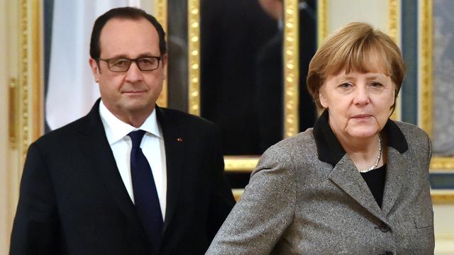 François Hollande et Angela Merkel. [AFP - Sergei Supinsky]