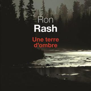 Couverture du livre de Ron Rash "Une terre d'ombre". [Editions du Seuil]