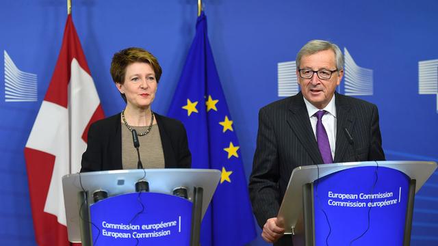 Simonetta Sommaruga et Jean-Claude Juncker. [AFP - Emmanuel Dunand]