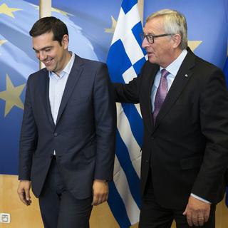 Alexis Tsipras et Jean-Claude Junker. [AFP - Julien Warnand]