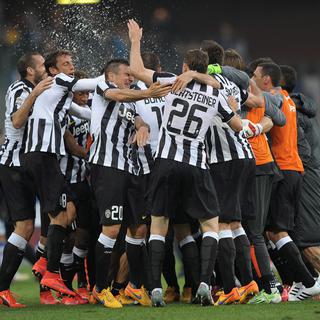 La Juventus de Turin a remporté le Championnat d'Italie de football pour la quatrième saison d'affilé. [Keystone - Carlo Baroncini - AP Photo]