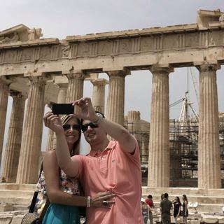 Les touristes sont de retour, pour le plus grand bien de l'économie grecque. [EPA/Keystone - Yannis Kolesidis]