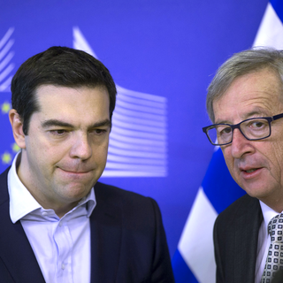 Alexis Tsipras et Jean-Claude Juncker ce vendredi matin à Bruxelles. [Reuters - Yves Herman]
