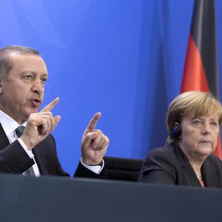Recep Tayyip Erdogan et Angela Merkel à Berlin en 2014. [Axel Schmidt - AP Photo]