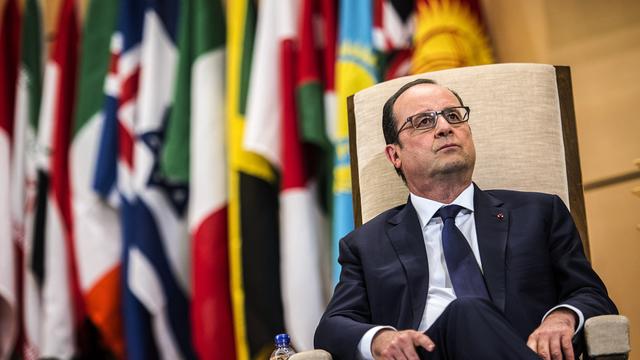 François Hollande a plaidé au Palais des Nations de Genève pour un accord sur le climat. [Jeff Pachoud - AFP Photo]