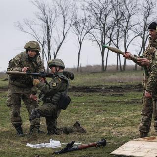 Des soldats russes, ici en Ukraine. (photo d'archives) [EPA/Keystone - Roman Pilipey]