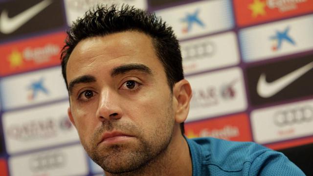 Xavi n'a connu que le Barça depuis ses débuts professionnels en 1998. [Keystone - Toni Albir]