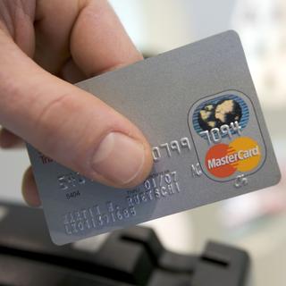 Mastercard est accusé d'avoir facturé des tarifs excessifs en Grande-Bretagne pendant 16 ans. [Keystone - Martin Rütschi]