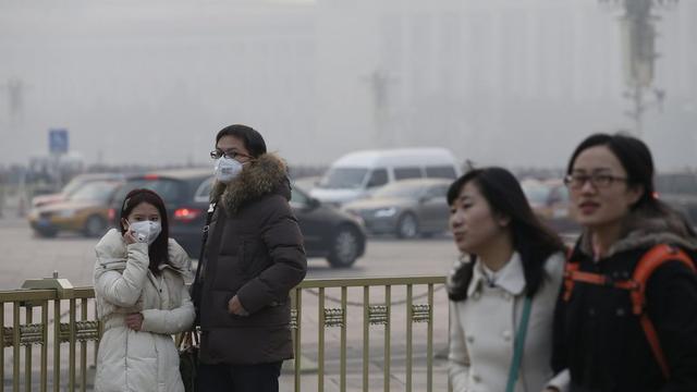 A Pékin, la ville est fréquemment prise dans un épais smog. [EPA/Keystone - Rolex dela Pena]