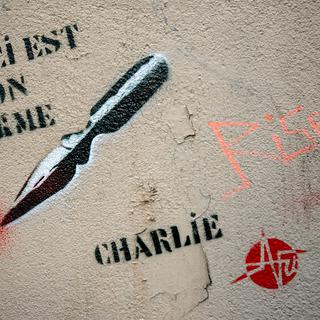 Un graffiti lié au mouvement de solidarité avec les victimes de l'attaque du journal satirique Charlie Hebdo. [Denis Prezat]