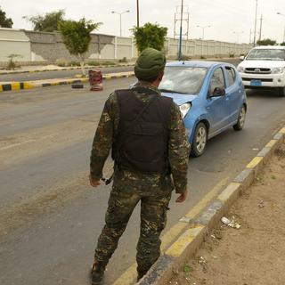 Des checkpoints ont été mis en place dans la capitale Sanaa, au Yémen. [EPA/Keystone - Yahya Arhab]