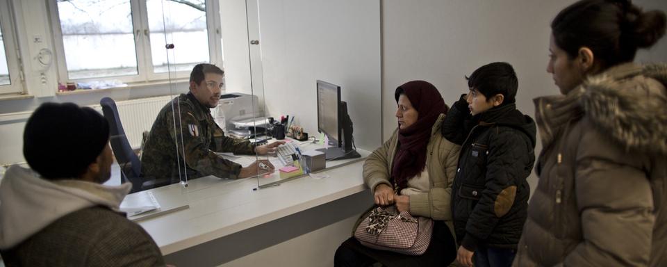 Le débat reste vif en Allemagne sur la manière d'intégrer les demandeurs d'asile. [key - AP Photo/Muhammed Muheisen]