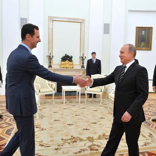 Bachar al-Assad et Vladimir Poutine ont discuté des frappes aériennes russes en Syrie. [AFP/Ria Novosti - Alexey Druzhinin]