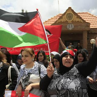 Des drapeaux palestiniens flottent pour marquer les 67 ans de la Nakba. [AP Photo/Mohammed Zaatari]