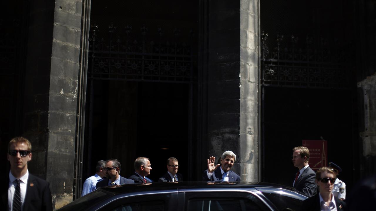 Le secrétaire d'Etat américain John Kerry après la messe à laquelle il a assisté dimanche à Vienne. [AFP - Carlos Barria]