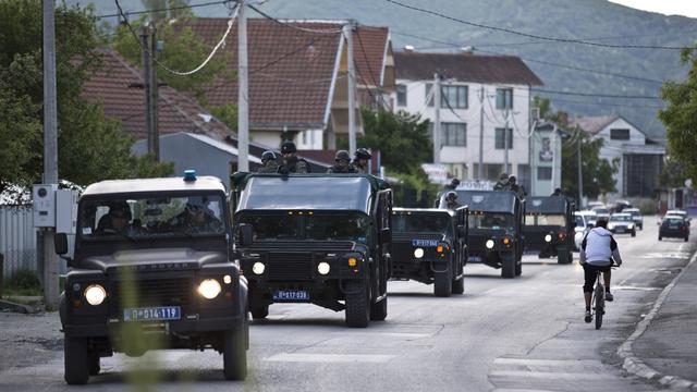 Les forces spéciales ont dû intervenir. [AP Photo/Keystone - Marko Drobnjakovic]