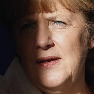 Time a souligné la capacité d'Angela Merkel à "faire face" aux défis actuels. [AP Photo/Keystone - Michael Sohn]