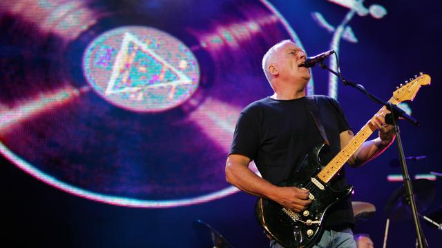 David Gilmour, chanteur et guitariste de Pink Floyd, lors d'un concert à Londres en 2005. [AFP - John D. McHugh]