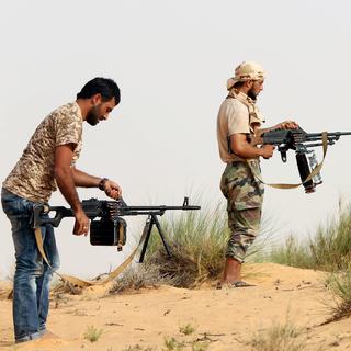 Des combattants de Fajr Libya, une coalition de milices au pouvoir à Tripoli. [afp - Mahmud Turkia]