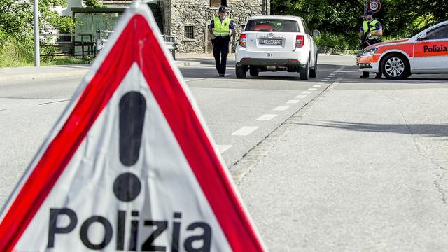 C'est la police cantonale tessinoise qui a annoncé le décès mardi d'une fillette de 5 ans laissée seule dans une automobile près de Lugano. [Keystone - Carlo Reguzzi]