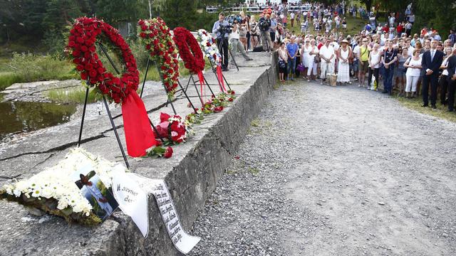 Une cérémonie en l'honneur des victimes de l'île d'Utoya, le 22 juillet 2014. [AFP - NTB scanpix - Heiko Junge]