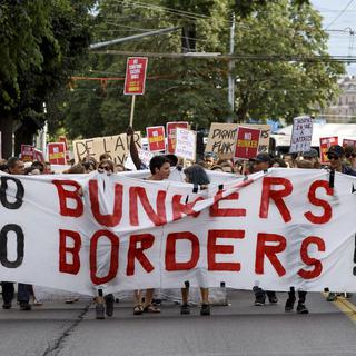 Des citoyens se mobilisent pour soutenir les migrants, comme ici à Genève le 26.06.2015. [Keystone - Salvatore Di Nolfi]