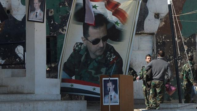 Une affiche du président syrien Bachar el-Assad, en plein coeur de Damas. [Mikhail Voskresenskiy]