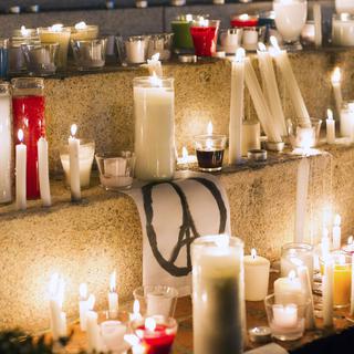Les hommages aux victimes des attentats se multiplient à travers le monde, ici en République dominicaine. [Erika Santelices]