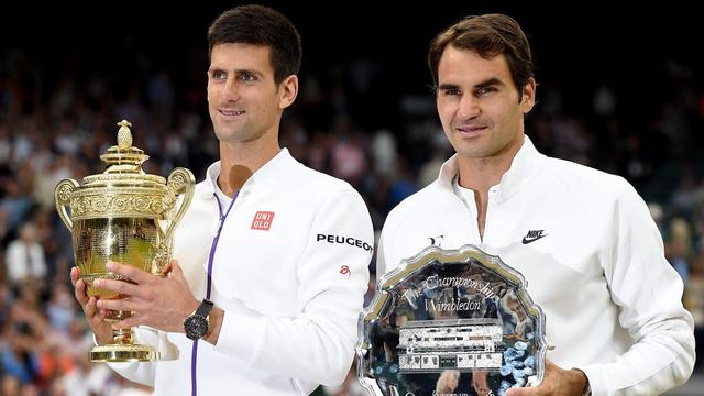 12 juillet, Londres. Novak Djokovic gagne une troisième couronne à Wimbledon en dominant Roger Federer 7-6 6-7 6-4 6-3. Le Serbe prive le Bâlois d'un huitième sacre sur le gazon londonien. [Andy Rain]