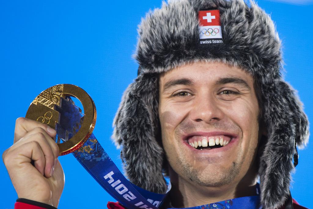 14 février 2014, Viletta devient champion olympique de super-combiné. [KEYSTONE - Jean-Christophe Bott]