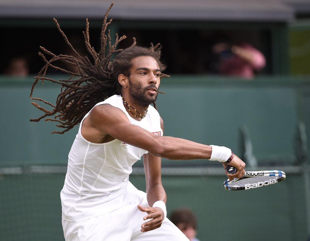 C'est la 2e fois que Dustin Brown bat le Majorquin. [KEYSTONE - Facundo Arrizabalaga]