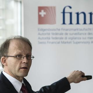 David Wyss de la Finma lors de la présentation du bilan 2014 mardi. [Peter Schneider]