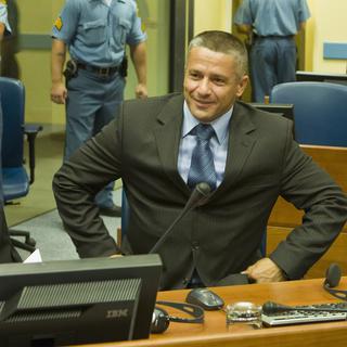 Naser Oric, à droite, à la Cour pénale internationale pour l'ex-Yougoslavie en 2008. [AP/Keystone - Zoran Lesic]