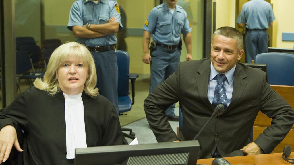 Naser Oric, à droite, à la Cour pénale internationale pour l'ex-Yougoslavie en 2008. [AP/Keystone - Zoran Lesic]