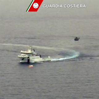 Capture vidéo des garde-côtes italiens. [Guardia Costiera/AFP]