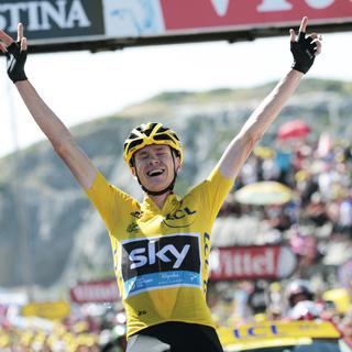 14 juillet, La Pierre-Saint-Martin: Chris Froome assomme le Tour de France dès la 1re étape de montagne dans les Pyrénées. Le Britannique semble avoir déjà course gagnée à 12 jours de l'arrivée. [Christophe Ena]