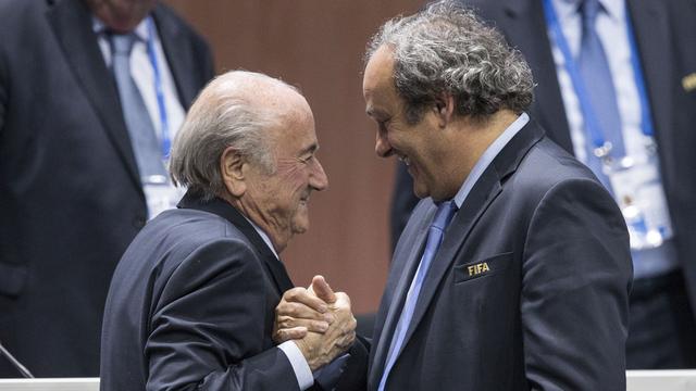 29 juillet: le bras de fer entre Sepp Blatter et Michel Platini peut commencer. Le Français (60 ans), actuellement à la tête de l'UEFA, a annoncé sa candidature à la présidence de la FIFA et espère donc succéder au Valaisan. L'élection aura lieu le 26 février 2016 à Zurich. [Keystone - Patrick B. Kraemer]