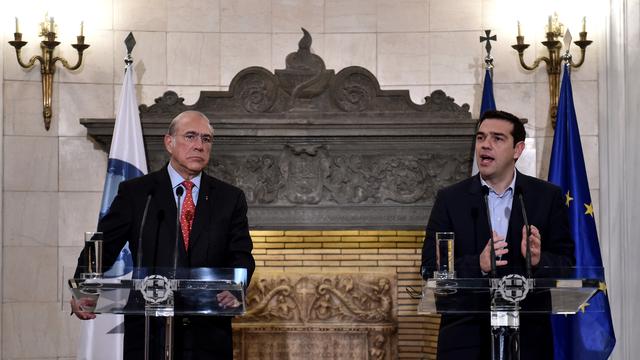 Le secrétaire général de l'OCDE, Angel Gurria, et le Premier ministre grec, Alexis Tsipras, le 11 février à Athènes. [Aris Messinis]