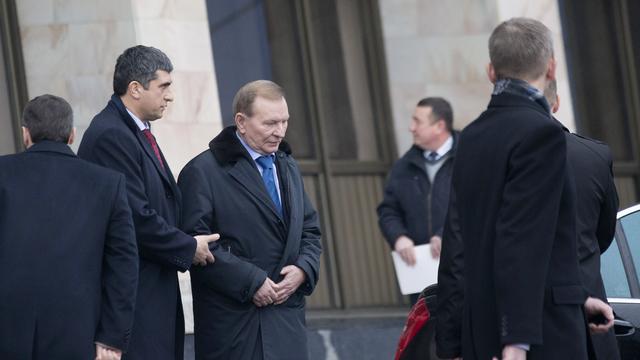 l'ex-président ukrainien Léonid Koutchma à son arrivée à l'aéroport de Minsk, le 31 janvier 2015.