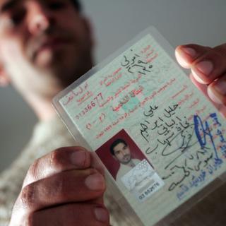 En Irak, des chrétiens militent contre une loi d’unification de la carte d’identité. Celle-ci oblige les enfants de couples mixtes à être déclarés musulmans. [AFP - Khaled Desouki]