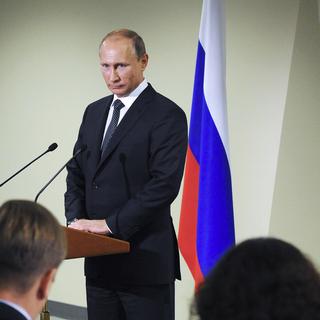 Le président russe Vladimir Poutine, lors d'une conférence de presse à l'ONU à New York. [RIA-Novosti, Kremlin Pool Photo via AP/Keystone - Mikhail Klimentyev]
