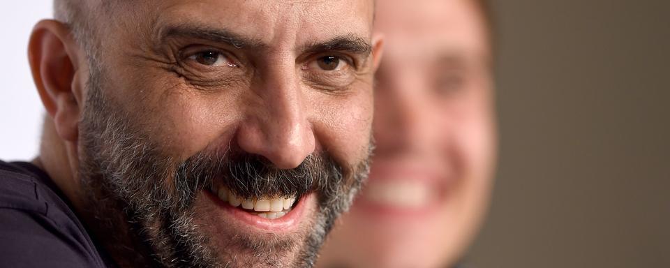 Le réalisateur argentin Gaspar Noe présente son film "Love" à Cannes. [AFP - Anne-Christine Poujoulat]