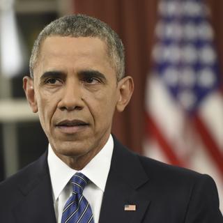 Dans son allocution, Barack Obama a promis de détruire le groupe Etat Islamique ou toute autre organisation qui chercherait à nuire aux Etats-Unis. [Saul Loeb/Pool]